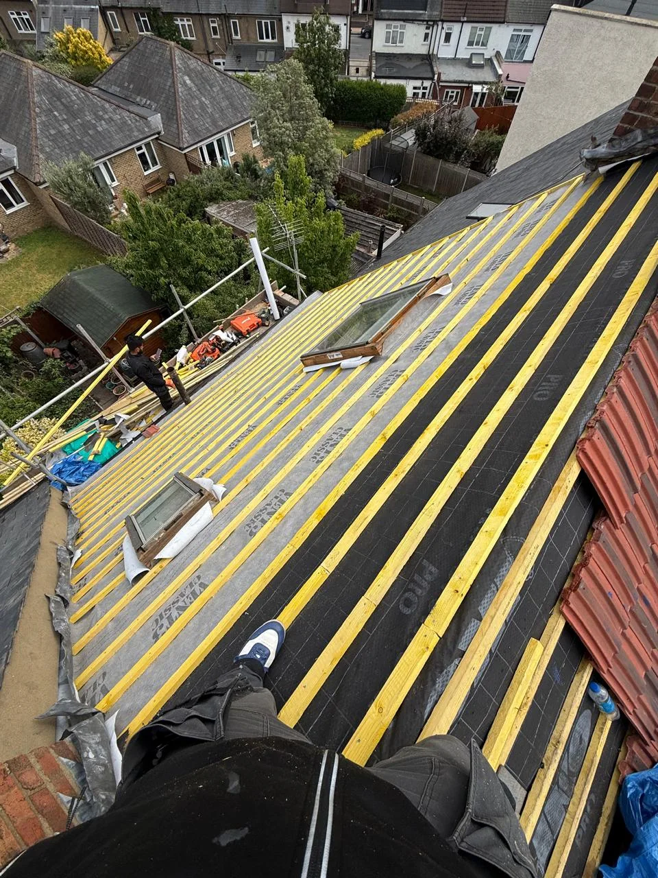 Roof stripped and prepared with membrane and battens